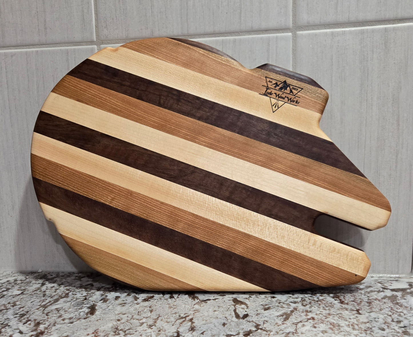 Walnut, Maple and Cherry Millennium Falcon Edge Grain Cutting Board.