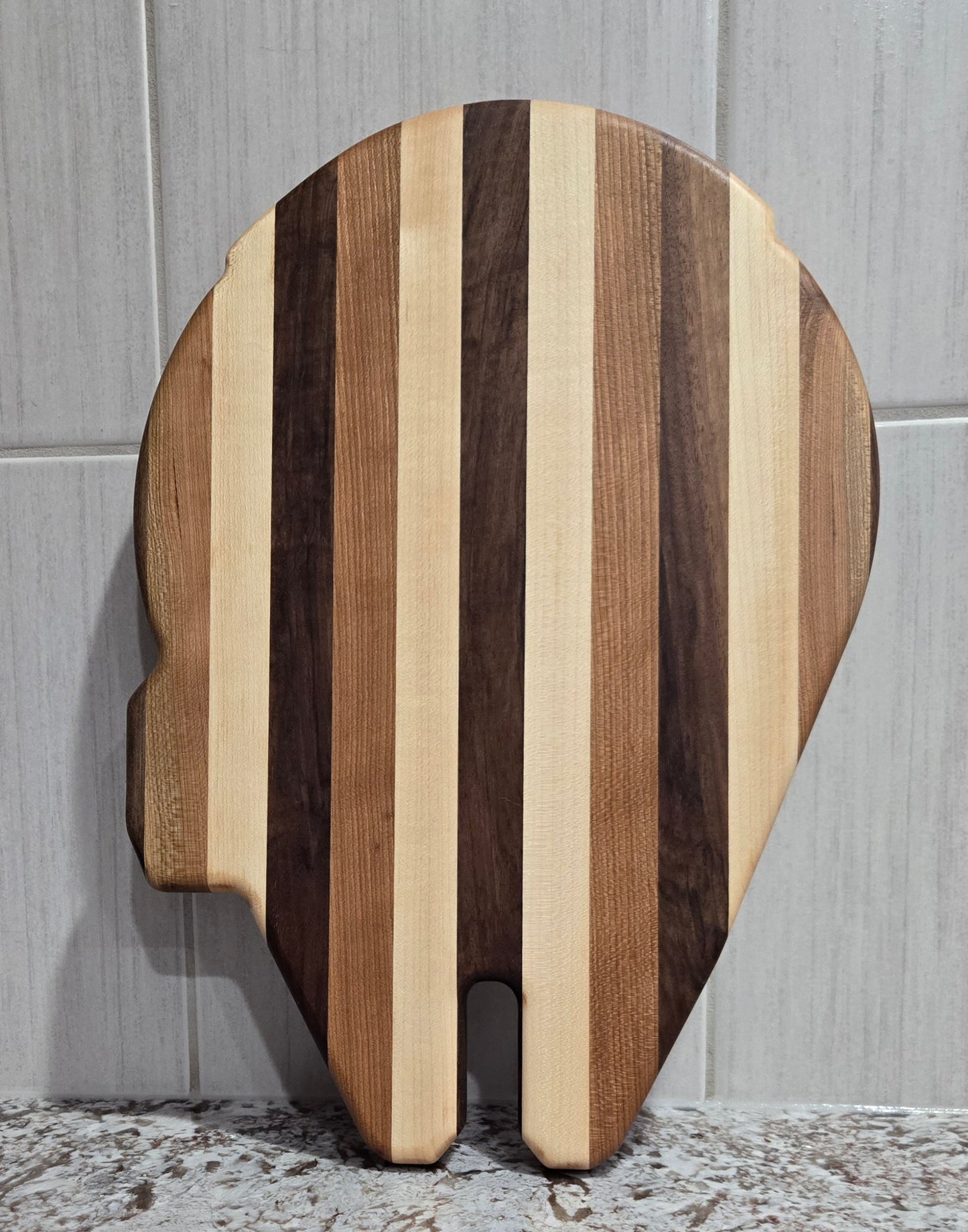 Walnut, Maple and Cherry Millennium Falcon Edge Grain Cutting Board.