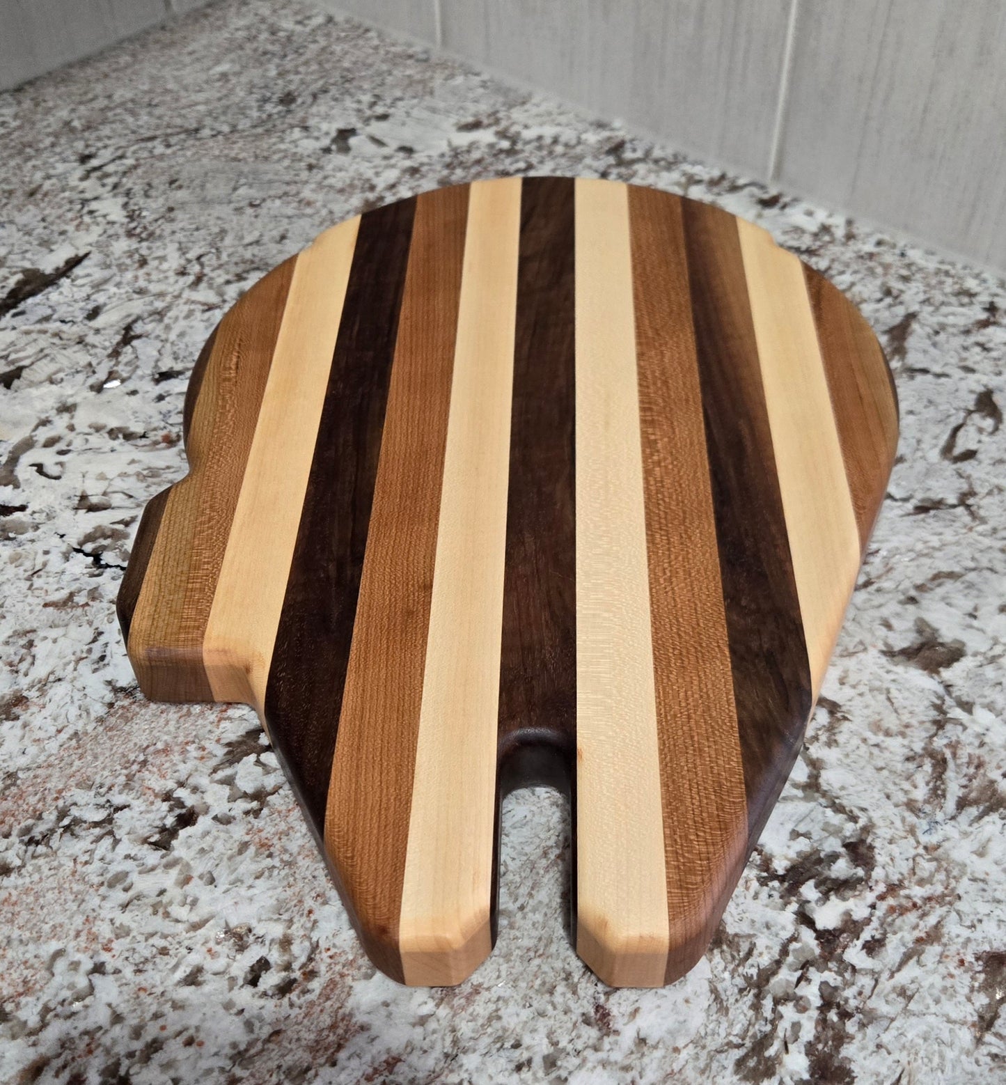 Walnut, Maple and Cherry Millennium Falcon Edge Grain Cutting Board.